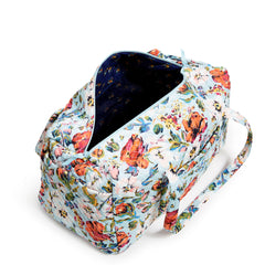 Large Travel Duffel Bag in Sea Air Floral pattern, top view with pocket unzipped. 