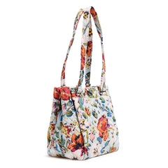 Vera Bradley Multi-Compartment Shoulder Bag in Sea Air Floral pattern, side view.