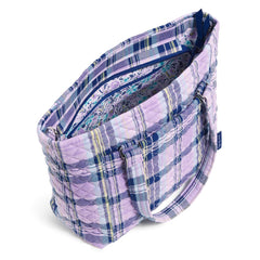 The Multi-Strap Shoulder Bag In Amethyst Plaid Pattern with the main pocket unzipped showing the interior of the handbag.