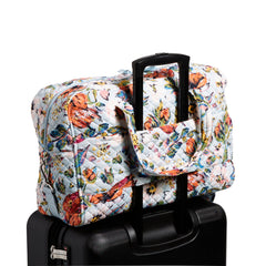 Vera Bradley Weekender Travel Bag in Sea Air Floral pattern, travel trolley sleeve view.