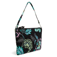 Vera Bradley RFID Convertible Wristlet In Island Garden Pattern, shown from the right side, with the handle raised.