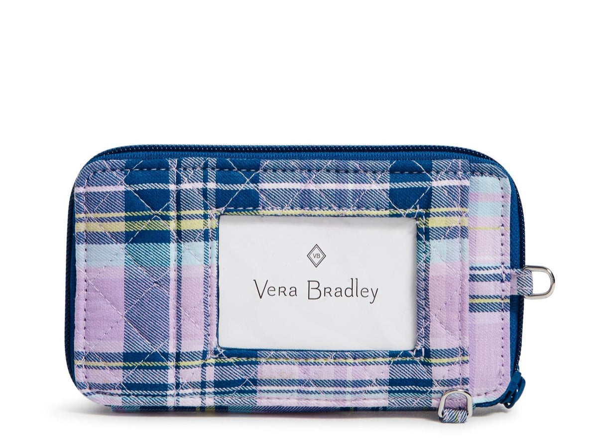 A Vera Bradley RFID Smartphone Wristlet In Amethyst Plaid Pattern, with a large ID window in the front.