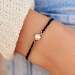 Pura Vida Simple Pearl Bead Silver Bracelet on a model.