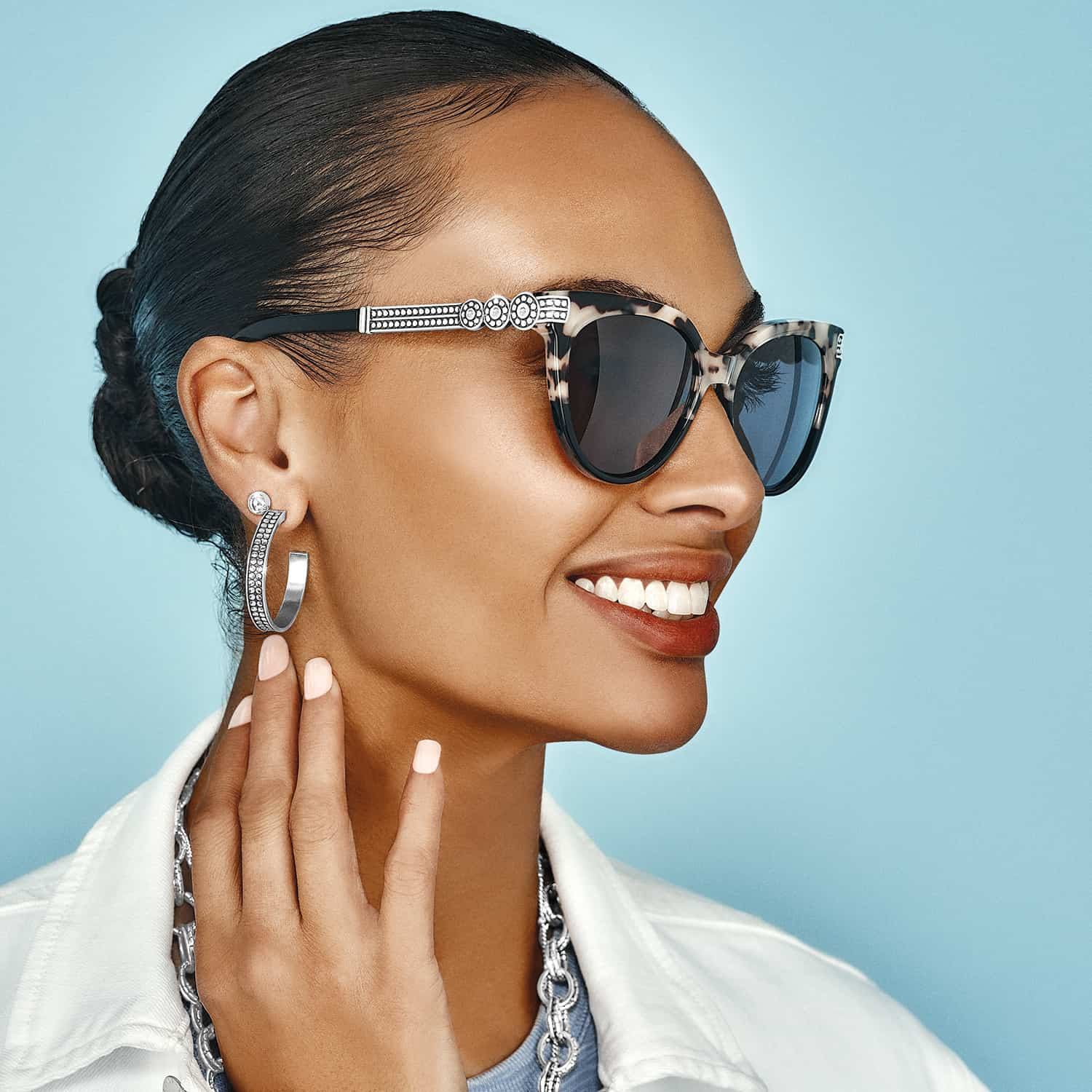 Brighton Pebble Medali Dual Tone Sunglasses on a model.