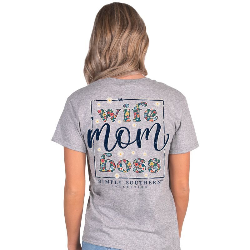 Simply Southern Women's Wife, Mom, Boss Short Sleeve Tee on a model, showing the back of the t-shirt.