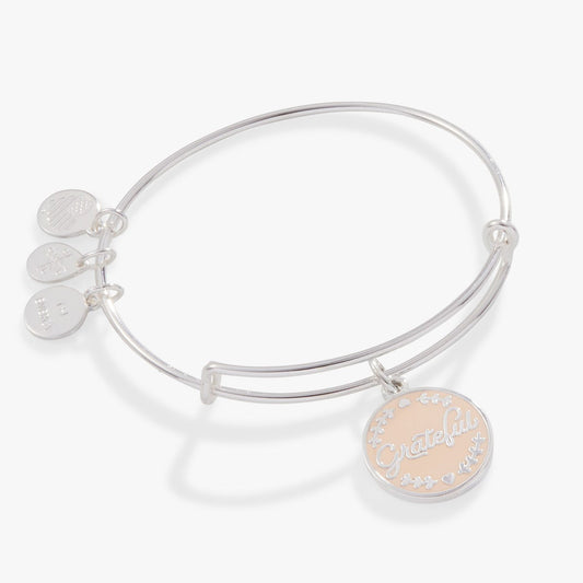 Alex and Ani silver bangle bracelet with a rose gold charm that reads "Grateful" 1200