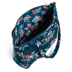 Unzipped main pocket of a Vera Bradley multi-strap satchel. Featuring their Rose Toile pattern