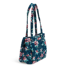 Side view multi compartment shoulder bag in Rose Toile pattern 