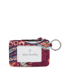 Vera Bradley zip ID case showing a large ID window no the front, with a key ring on the side.